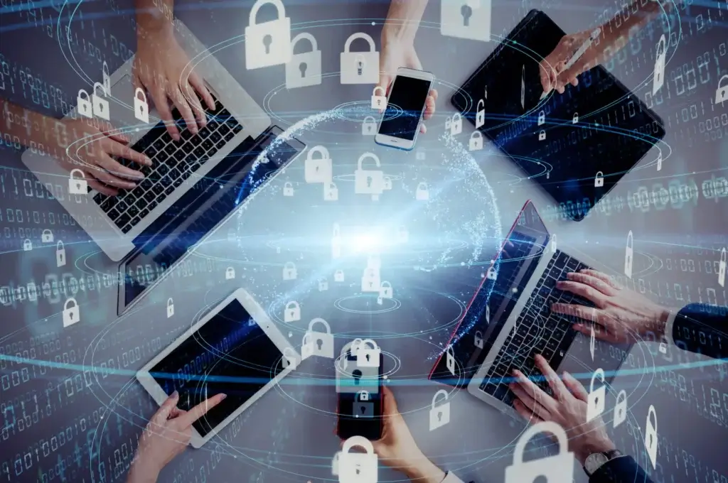 Several people use laptops, tablets, and smartphones at a table. Overlay graphics of locks and a globe symbolize digital security, data protection, and global connectivity. The composition conveys the theme of cybersecurity and technology integration.