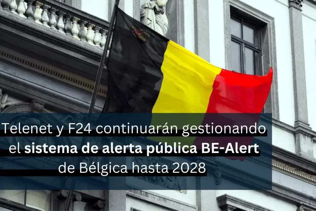 Una bandera belga en un edificio ornamentado. El texto superpuesto en español dice: "Telenet y F24 continuarán gestionando el sistema de alerta pública BE-Alert de Bélgica hasta 2028.