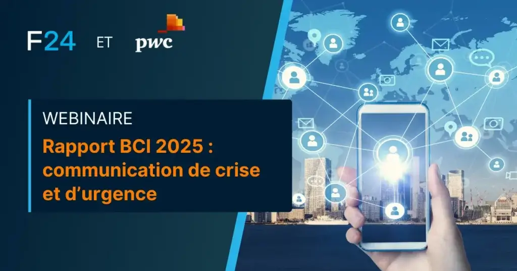 A promotional image for a webinar hosted by F24 and PWC features text: "Webinaire: Rapport BCI 2025 - communication de crise et d’urgence." A hand holds a smartphone with a city skyline and digital icons in the background, highlighting the theme of strategic crisis management.