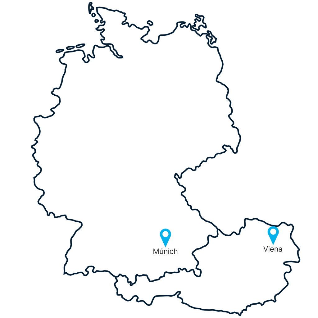 Outline map of Alemania and Austria with two blue location pins; one in southern Alemania and one in eastern Austria. No other details or labels are visible on the map.