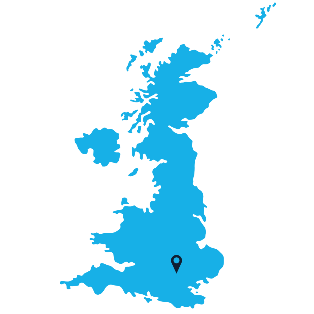 A simple blue map of Great Britain on a light cyan background with a location pin marker placed in the southern-central region of England.