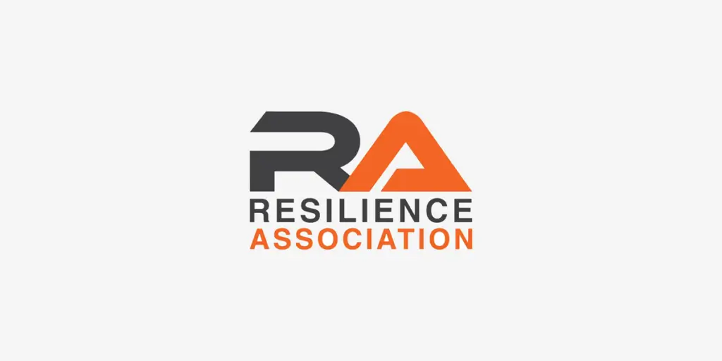 Logo with large stylized letters "RA" above the words "RESILIENCE ASSOCIATION." Featuring Find F24 @ beside the design, with "RA" and "RESILIENCE" in black and the orange "A" and "ASSOCIATION" on a light gray background.