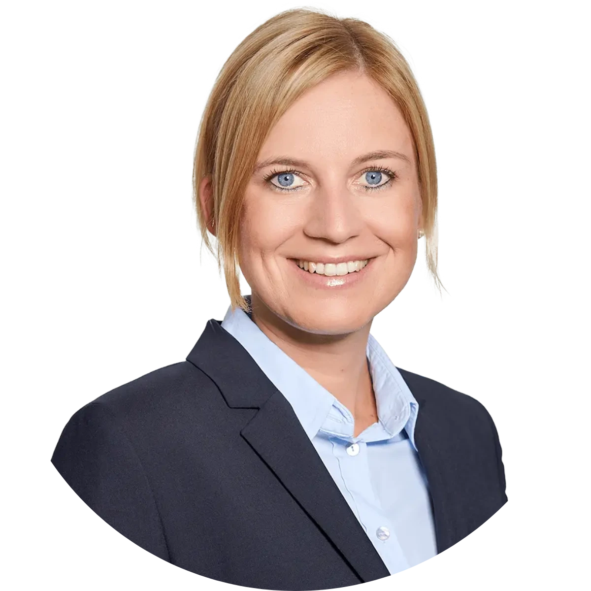 Smiling woman with blonde hair in a low bun, wearing a navy blazer and light blue collared shirt, posing against a plain white background—her confident demeanor reflects an understanding of how operational resilience works in professional settings.